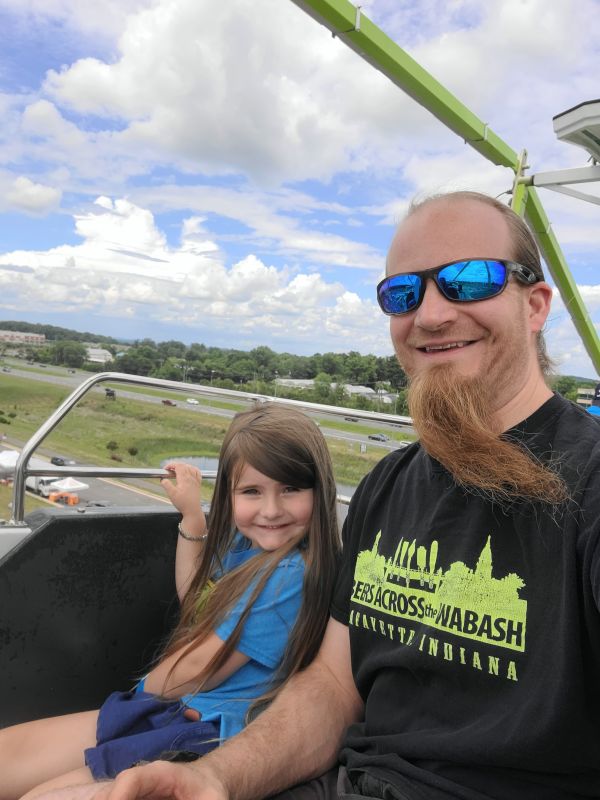 Riding the Ferris Wheel at a Local Fair